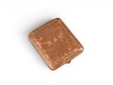 an old book on a white surface with a white background
