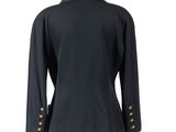 the back of a black jacket with gold buttons on a mannequin dummy