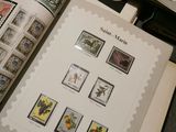 a lot of stamps on the pages of a book