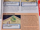 an open book with a picture of a dragon on it