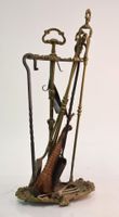 Serviteur de cheminée en bronze de style Louis XV