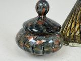 two vases sitting next to each other on a table
