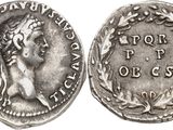 une pièce d'argent représentant une femme