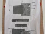 two pieces of paper with a drawing of a toilet and a toilet paper roll