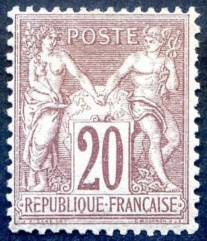 a stamp with a picture of two women shaking hands