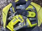 a yellow tool bag with tools in it on the ground