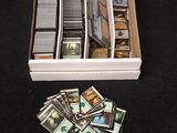 a white box filled with lots of cards sitting on top of a table