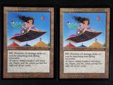 these are two cards with a picture of a girl riding a skateboard