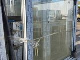 a large window that is sitting on a pallet