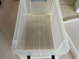 a plastic container that is sitting on a counter