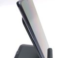 a close up of a cell phone on a stand