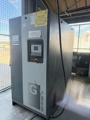 an image of a machine that is sitting in a garage