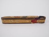 an old wooden case with a floral design on it