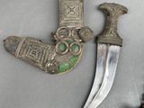a knife and other items that are on a table