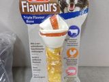 a package of treats and a dog toy on a table