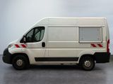 a white van that is parked in a parking lot