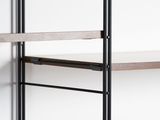 a shelf that has two shelves on each side of it