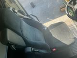 a picture of a seat in the back of a truck
