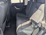 the interior of a car with two rows of seats in it