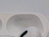 a pair of airpods sitting on top of a box