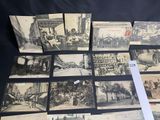 several old black and white photographs of people and vehicles on a table