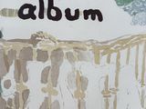 a picture of a picture of a baby ' s crib with the name album written on it