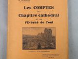 an old book with a picture of a castle in the background