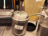 many pots and pans that are on the counter