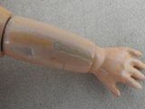 a toy hand that is sitting on the floor