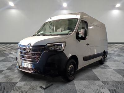 a white van that is sitting on a checkered floor