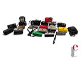 many different types of electronic devices on a white surface