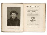 an old book with a picture of a man wearing a hat