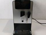 an image of a coffee machine on a table