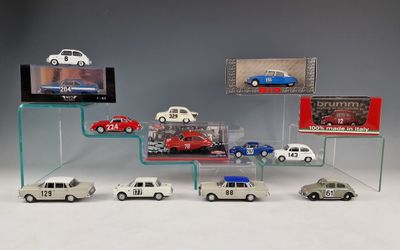 a lot of cars that are on display in a display case