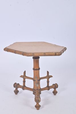 an image of a small table with a wooden top on a white background