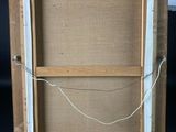 a wooden easel with a canvas on top of it sitting on a pallet