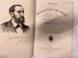 un vieux livre sur lequel figure le dessin d'un homme barbu