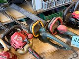 many different types of chainsaws on display in a store