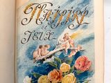 un livre sur lequel figure l'image d'un Cupidon