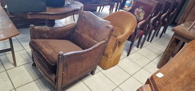 a lot of chairs and tables in a room