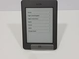 a kindle that is sitting on a table