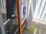 a sign on the side of a building that says a vending machine