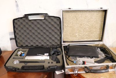 two suitcases that are sitting on a table