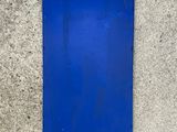 a blue sign on the side of a building