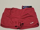 a pair of red shorts that are on a table