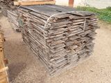 a pile of wood that is sitting on the ground