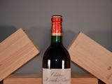 a bottle of wine that is sitting on a table
