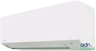 a white air conditioner sitting on top of a white wall