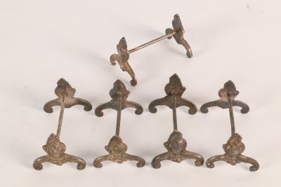 four antique cast iron door handles with a bird on them