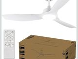 a white ceiling fan with a remote control next to a box